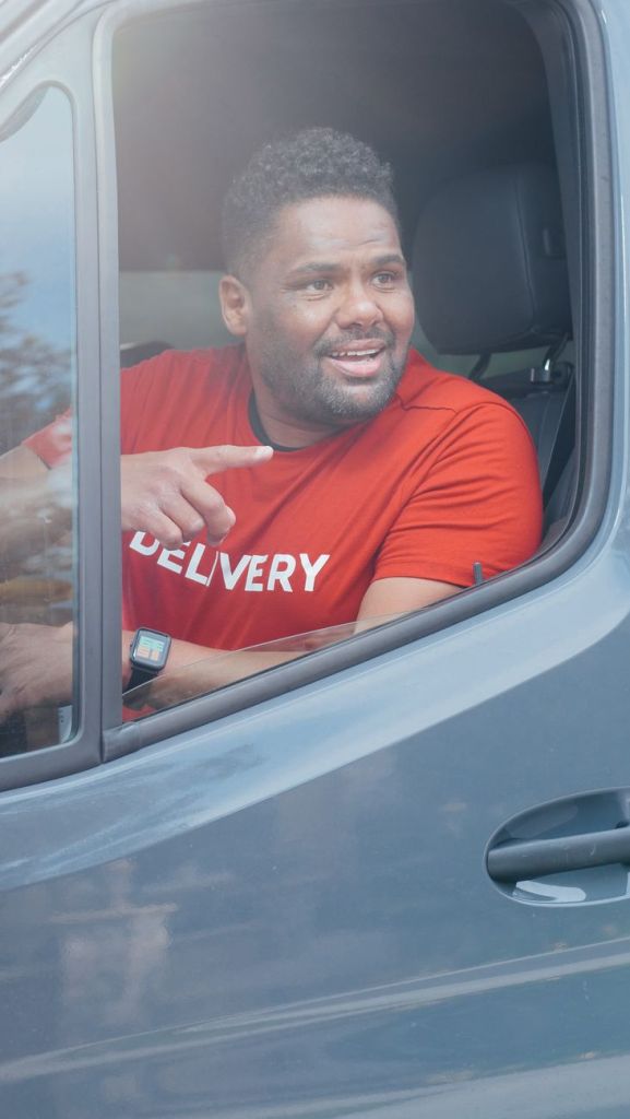 a man riding a van
